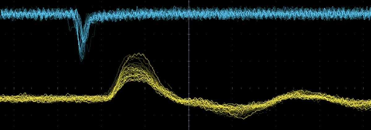 Overlaid oscilloscope traces comparing the 3 nanosecond PCB anode pulse in blue with a 10 nanosecond standard metal anode pulse in yellow